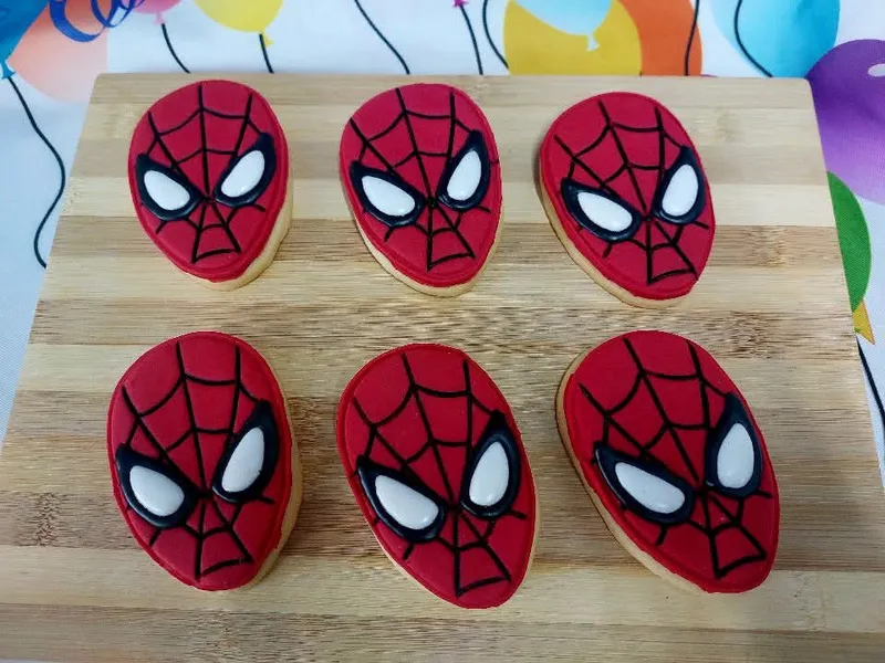 Spider-Man themed iced cookies for boys birthday celebrations