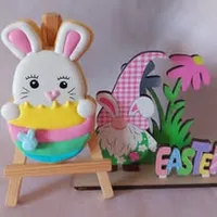 Adorable bunny peeking out of a colorful Easter egg iced cookie
