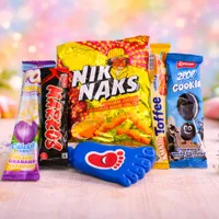 Standard party pack with toy including Nik Naks, lollipop, cookie, chocolate, toffee and small toy